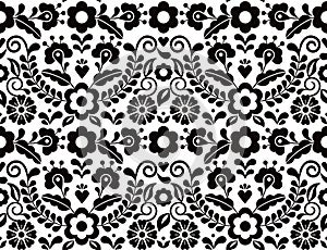 Seamless vector pattern with Mexican floral morif, black and white textile or fabric print design inspired by traditional embroide