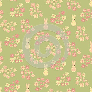 Seamless vector pattern with pink and yellow bunnies and foral hearts on a fresh green background
