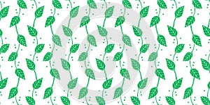 Seamless vector pattern of silhouettes delicate twigs with green leaves, background for paper,wallpaper,textile
