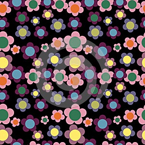 Seamless vector pattern of simple bright flowers on a black background