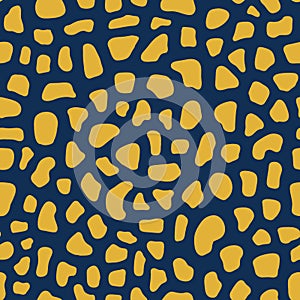 Seamless vector pattern stylized animal skin texture. Abstract background with mosaic shapes. Yellow gold shapes on blue backdrop.