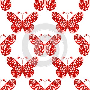 Seamless vector pattern. Symmetrical background with red ornamental decorative butterflies on the white backdrop.