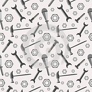 Seamless vector pattern with tools. Chaotic baackground with screws, nuts, hammers, wrenches and screwdrivers on the grey backdrop photo