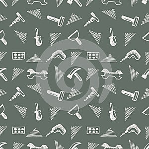 Seamless vector pattern with tools. Hand sketch drawn background with hammers, screws, nuts and wrenches on the grey backdrop