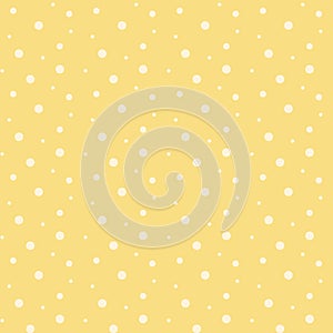 Seamless vector pattern with white polka dots on yellow background. Design for fabric