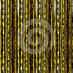 Seamless watercolour shibori tie-dye pattern of yellow color on black silk. Hand painting fabrics - nodular batik