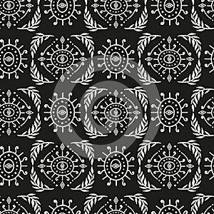 Seamless white Damask pattern on a black background.