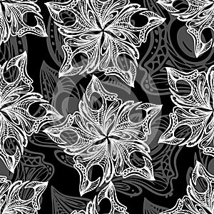 seamless white and gray pattern of abstract decorative elements on a black background