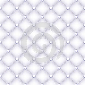 Seamless white quilted background with pins.
