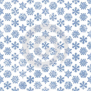 Seamless winter New Year and Christmas pattern. Vintage print for gift wrapping. Grunge texture. Set of snowflakes on a white