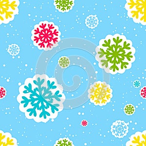 Seamless winter pattern with colorful snowflakes