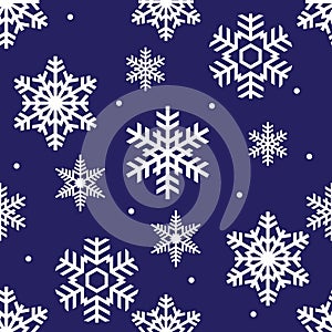 Seamless winter pattern of white openwork snowflakes