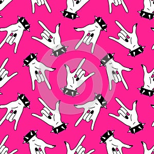 Seamless y2k pink pattern in 90s style. Trendy bg with punk girl rock hand sign. Nostalgia for 2000s