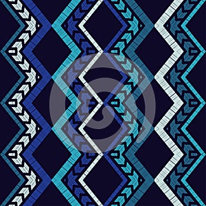 Seamless zigzag pattern. Abstract background for textile design. Manual hatching. Ethnic boho ornament.