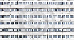 Seamlessly tilable image of a window front of a run-down building made with precast concrete slabs photo