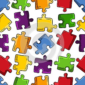 Seamlesspattern with colored bright jigsaw puzzle pieces on white background. Hand drawn vector sketch illustration in engraving photo