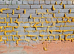 Seams covered with mounting foam in brickwork