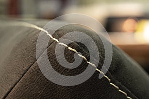 Seams on the sofa close-up. Technology Concept. Exhibition of sofas