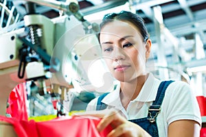 Seamstress in a chinese textile factory