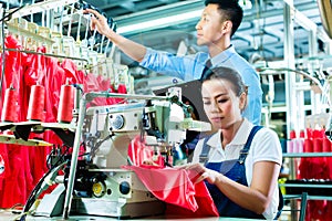Seamstress and shift supervisor in textile factory