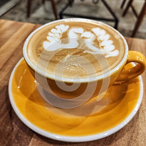 Sean shaped latte artis foam on coffee