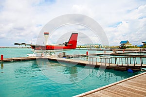 A seaplane at a mooring at ocean