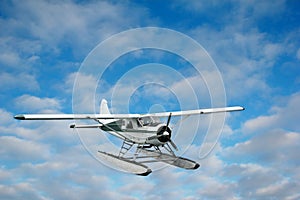 Seaplane over the clouds