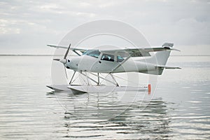 The seaplane is on the surface of the water. Mauritius.