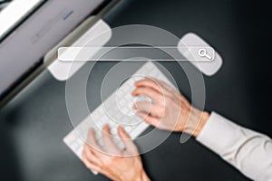 Search advertising. Internet online searching engine selective focus. Hand touching computer for data optimization