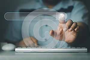 Search button on virtual screen pressed with finger. Concept of SEO