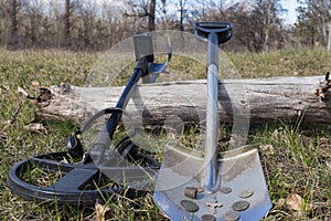 Search for coins with metal detectors.