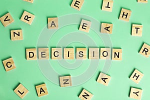 Search for decision concept. The word Decision composed of heaps of different letters on a green background