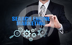 Search engine marketing - SEM concept. Businessman or programmer is focused to improve SEM and web traffic.