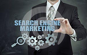 Search engine marketing - SEM concept. Businessman or programmer is focused to improve SEM and web traffic.