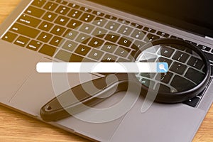 Search engine optimization and notebook browsing bar internet data information networking concept