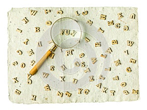 Search FUN magnifier word and letters on a vintage paper