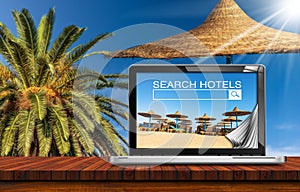 Search Hotels Website on Laptop Computer Screen - Booking Concept