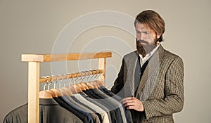 In search of inspiration. bearded man tailoring clothes. formal and office wardrobe. businessman. confident tailor
