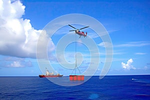 Search and rescue operation in sea. Emergency rescue helicopter flies over sea surface, looking for victims after crash