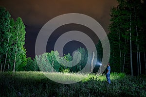 Searching with flashlight in outdoor