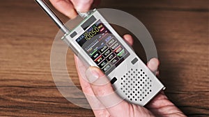 Searching Frequency of Radio Stations on Modern Portable Radio With Digital LCD