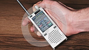 Searching Frequency of Radio Stations on Modern Portable Radio With Digital LCD