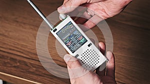 Searching Frequency of Radio Stations on Modern Portable Radio With Digital LCD