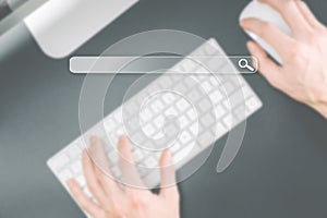 Searching internet. Online website search engine selective focus. Blured hands using computer for searching browsing