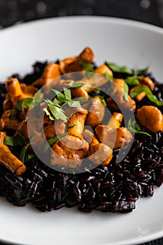 Seared girolles mushrooms with black rice