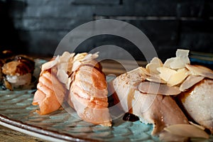 Seared salmon nigiri, and set of seared nigiri sushi.