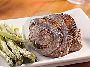 Seared tenderloin steak with asparagus.