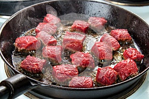 Searing beef cubes