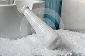 Seasalt with White Ceramic Pestle and Mortar and Turqouise Glass photo