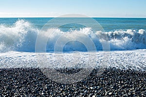 Seascape: autumn sea and pebble beach